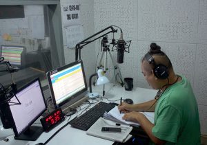 Kapol Thongplab, or DJ Phong, of Shock Radio prepares for his nightly radio show in which listeners call in to share their ghost stories, Bangkok, Thailand, 22 October 2015. Photo: Cod Satrusayang/dpa