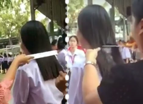 Thai teachers rule as 4th year teenage student has hair cropped in public after defying school code