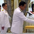 PM urges ministers to ‘create a sense of unity’ in the country as Thai King swears in new cabinet