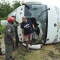 10 Italian tourists injured in Lampang, one woman seriously, after a minibus slides off a wet road