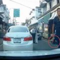 Disturbing road rage incident sees motorist calmly threatened with a gun for honking his car horn