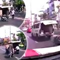 Ambulance expels female patient on a stretcher on to busy Bangkok street while speeding to hospital in traffic