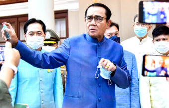 Under pressure Thai PM apologises to the media over spraying incident but then scolds them again over footage