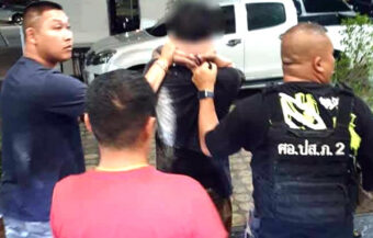 Two arrested after gang used woman planted at a party to gain access to home of Chinese visitors