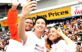 Move Forward leader denies claims he held shares in media company barring him as a Bangkok MP 