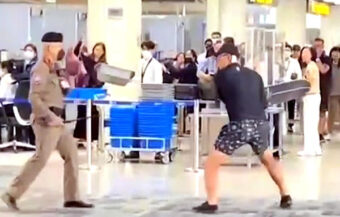 Chinese tourist attacks police at Don Mueang Airport in prolonged tirade until calmed down by officers