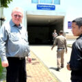 American academic released on bail but fights for his Visa. House panel to hold an April 17th hearing on the case