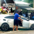 Police investigate British BMW driver who crashed into a local Phuket roadside shop on a notorious road