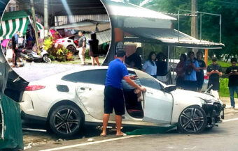 Police investigate British BMW driver who crashed into a local Phuket roadside shop on a notorious road