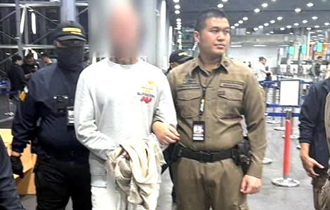 Australian tourist flying in from Bali handcuffed after he came through Immigration for armed robbery