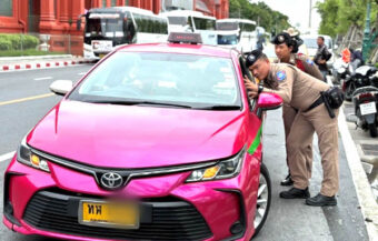 Police crack the whip on Bangkok taxis just 24 hours before showdown meeting over Airport closure threat