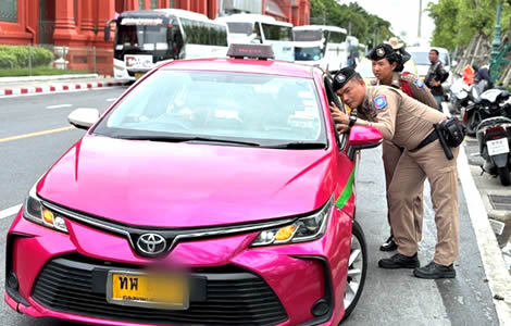 Police crack the whip on Bangkok taxis just 24 hours before showdown meeting over Airport closure threat