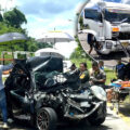 Sleep-deprived trailer truck ploughed into stationery passenger car at traffic lights. Driver was asleep