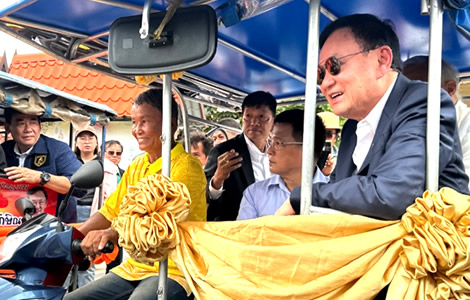 Thaksin lifts morale of followers as US deal is in the works with a final rate close to that of Vietnam