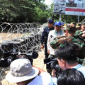 Cambodian recoils at Thai concertina wire makeshift barriers just erected along the contentious border