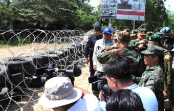 Cambodians recoil at Thai concertina wire makeshift barriers just erected along the contentious border