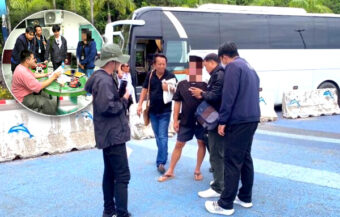Chinese tourist guide arrested at Bali Hai Pier in Pattaya as he led tourists from a bus in crackdown