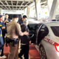 Former Buddhist Office bigwig flown home from the United States after being extradited to face charges