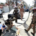 Western foreigner naked in the red light area of Pattaya cries out to God as locals react with shock on their commute