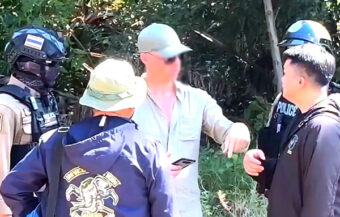 46 year old American wearing Ray Ban sunglasses detained in Surin on suspicion of spying on military