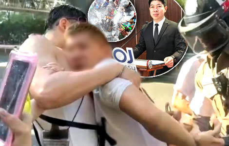 Foreign tourist arrested in Bangkok for groping reporter's buttocks during Songkran frolics in Pathumwan