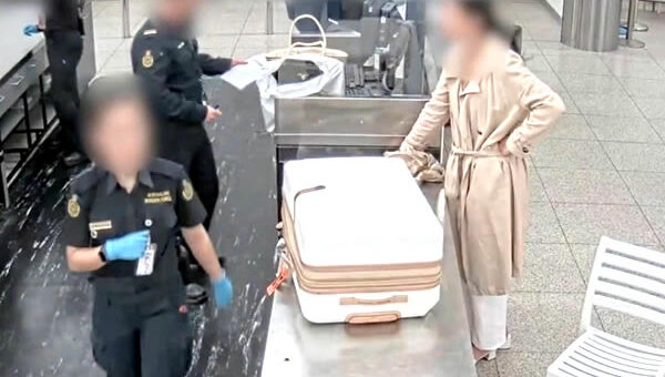 Another woman arrested off a flight from Thailand in late May smuggling dangerous drugs into Australia