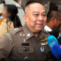 Police are to summon, charge staff found at a private property in Nonthaburi working on exam papers
