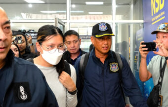 Freed 28-year-old Thai woman returns to Bangkok and meets Narcotics Suppression Bureau officers