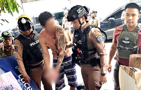 American Alexander Troy Lopez, 29, faces attempted murder and robbery after slashing a Bangkok policeYoung American driven by meth habit slashes Bangkok police officer's neck. Charged with attempted murder
