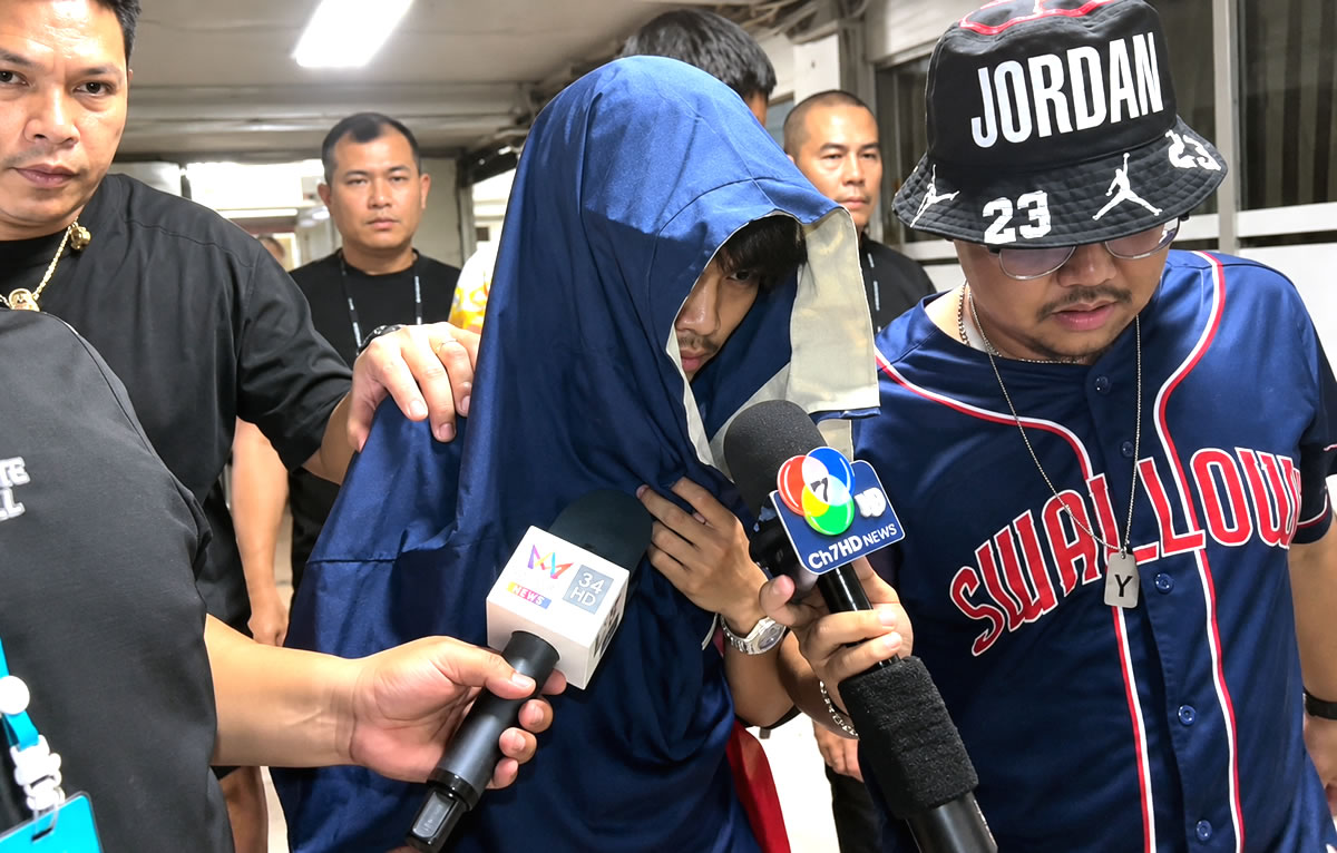 19 year old hothead lands in jail after punching female driver who honked her car horn at him in Bangkok
